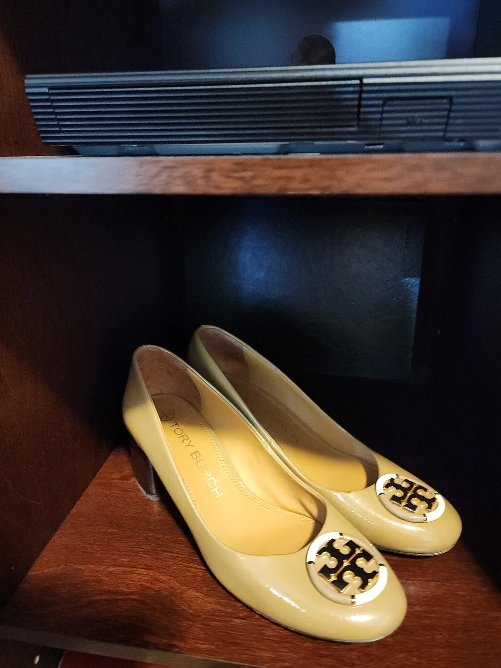 Tory Burch Beige Patent Leather Block Heel Pumps with Gold Emblem